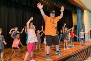 Campers and Counselor dancing at Renbrook Summer Camp