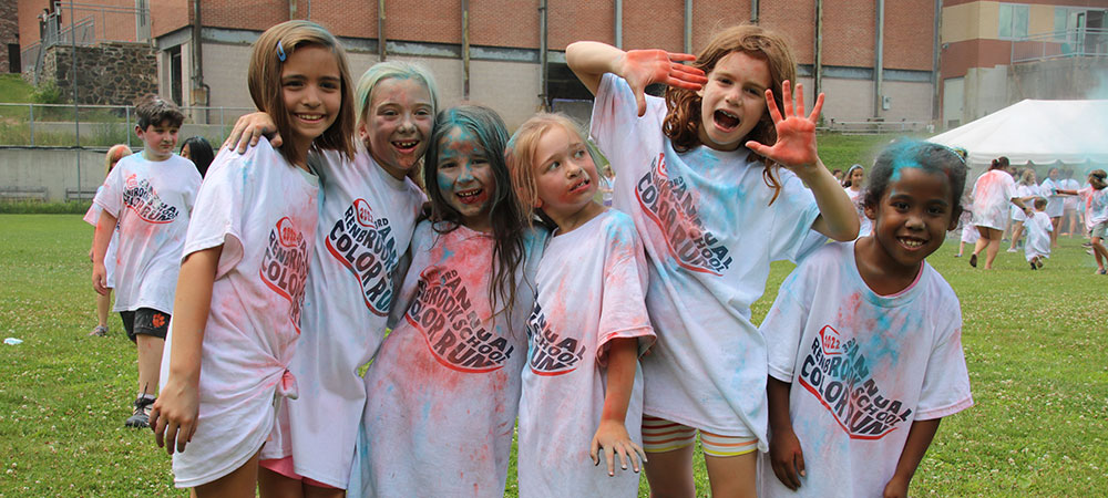 Campers doing the Color Run at Renbrook Summer