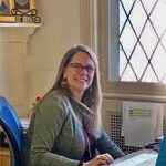 Jen Caswell at her desk