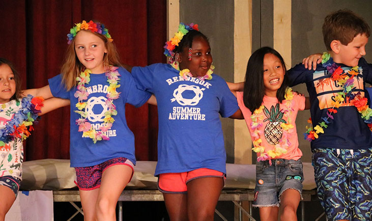 Kids performing on stage