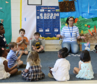 students in preschool morning meeting at private preschool