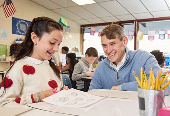 Ben Digel is a teacher with a student