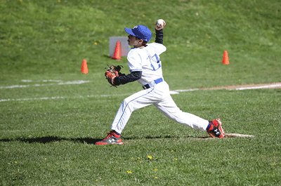 Baseball - Boys Junior Varsity pitcher in action