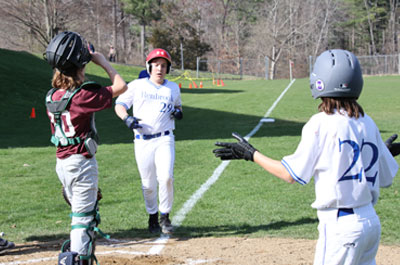 Baseball - Boys Varsity player running into home