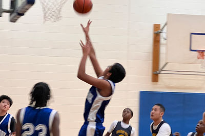 Basketball - Boys Varsity lay up