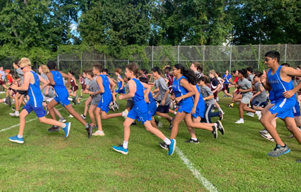 Cross Country team running in pack