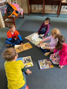 Kindergarten students love choosing books from the library
