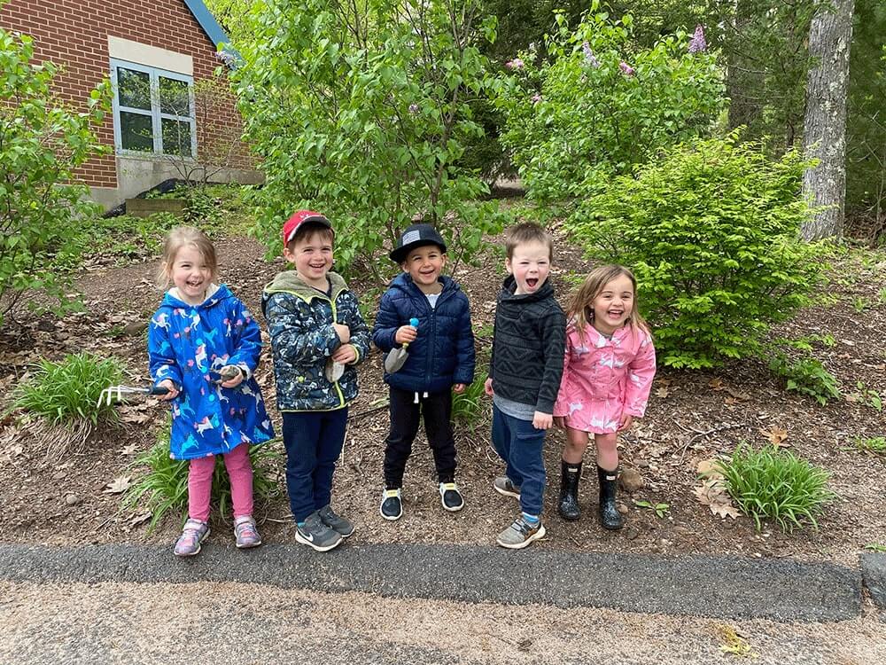 Renbrook Preschool Kids on Curb Laughing