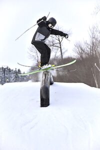 upper school student on a ski jump element