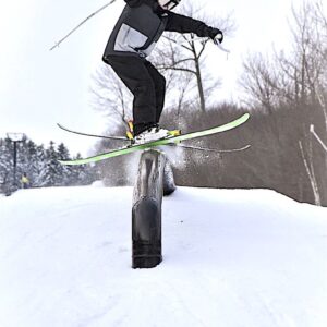 upper school student on a ski jump element