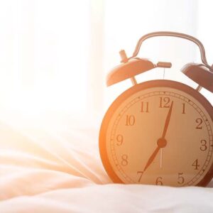 Alarm Clock on Bed
