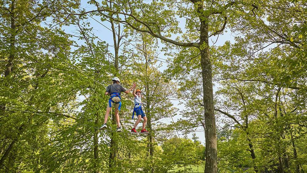 Students on Renbrook High Ropes Course