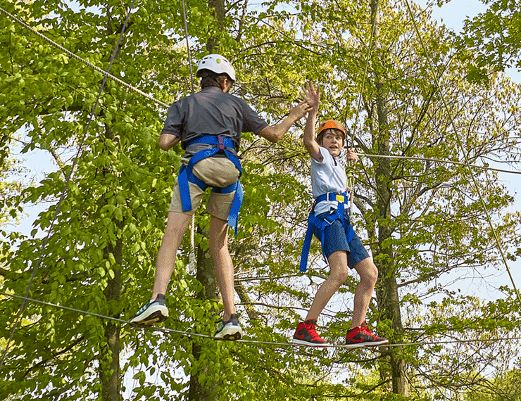 Middle school students bravely conquer the Renbrook School Challenge Course with tremendous courage.