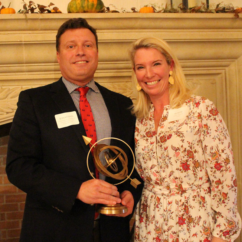 Award recipient and wife posing