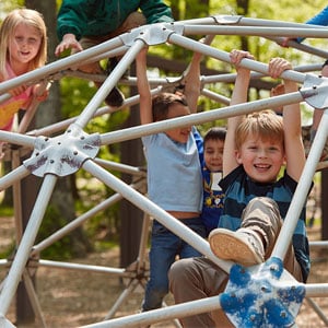 children playing on jungle gym