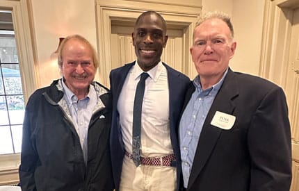 Three men posing