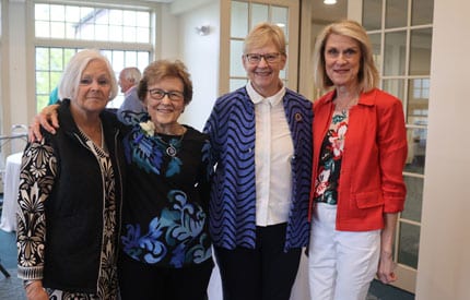 Former teachers posing with Jane Shipp