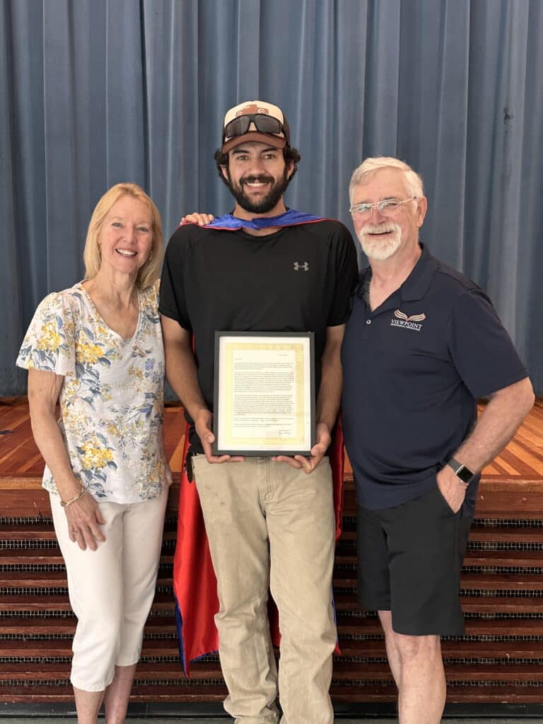 Aidan Guzman receiving award