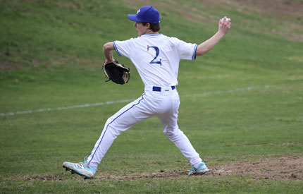 male baseball pitcher poised to pitch