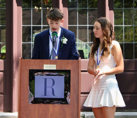 boy and girl graduation speakers