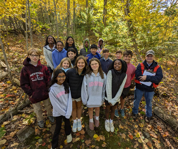 students posing with forester