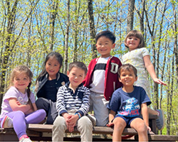 diverse group of preschool children posing for a picture
