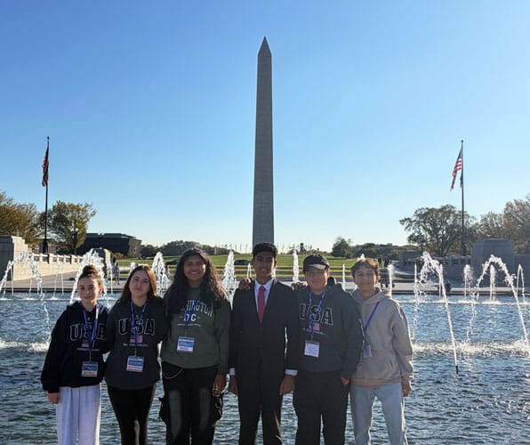 6 eight-grade students who are members of Renbrook's Diversity & Belonging Student Council posing in front of Washington Monument