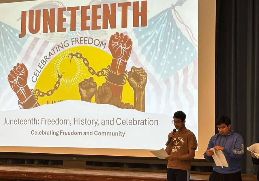 Juneteenth Three students presenting to their peers about Juneteenth
